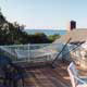 exterior deck with view of water